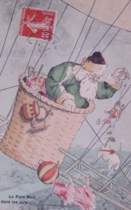 1900s Santa Claus Green Robe Flying Balloon Drops Toy Vintage Christmas Postcard