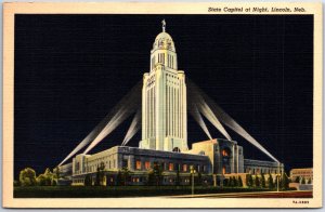 VINTAGE POSTCARD THE STATE CAPITOL WITH SEARCH LIGHTS AT NIGHT OMAHA NEBRASKA