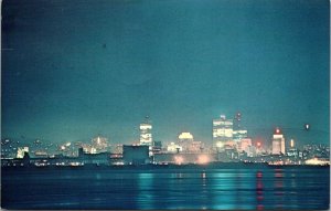 VINTAGE POSTCARD MONREAL SKYLINE AT NIGHT 1960s