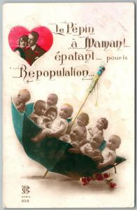 MULTIPLE BABIES in UMBRELLA VINTAGE POSTCARD