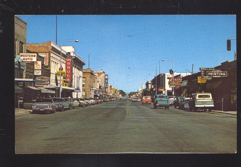 SHERIDAN WYOMING DOWNTOWN MAIN STREET SCENE 1960's CARS VINTAGE POSTCARD