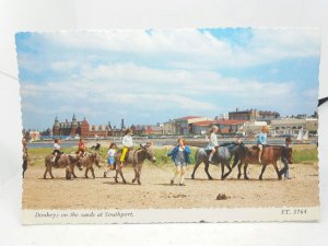 Children Riding Donkeys on the Sands at Southport Lancs Vintage Postcard 1975