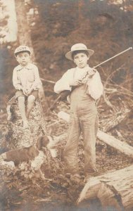 RPPC CHILDREN GUN HUNTING DOG REAL PHOTO POSTCARD (c. 1910)