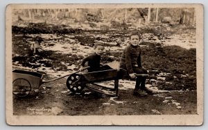 RPPC Two Darling Boys  Wheelbarrow Wagon Cart And Puppy Dog Postcard O21