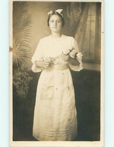 Pre-1918 rppc PRETTY GIRL WITH BOW IN HAIR HOLDS ROSE FLOWERS r5833