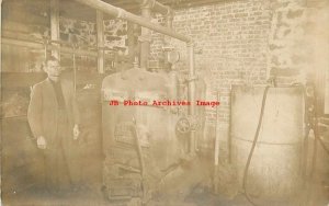 Unknown Location, RPPC, Man Standing By a Furnace? A.L. Baskin?