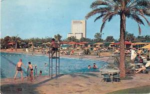 Shamrock Swimming Pool with Prudential in Background Houston