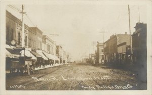 Early RPPC Postcard Lewiston MT main Street Phillips Drug Co. Stafford Beer Bear