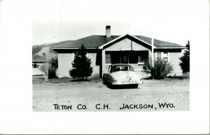 RPPC Jackson Wyoming WY - Teton County Courthouse w Car  UNP Postcard T12