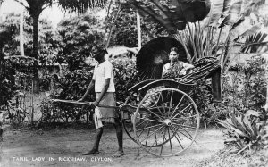 RPPC TAMIL LADY IN RICKSHAW CEYLON REAL PHOTO POSTCARD (c. 1910)