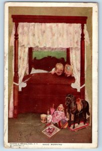 c1910's Christmas Children On Bed Horse Doll Ball Toys Philadelphia PA Postcard
