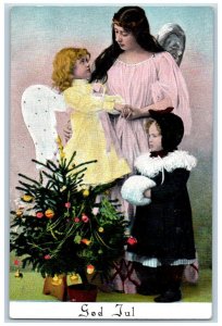 Christmas Postcard Christmas Tree Decorated Angel Little Girl Handwarmer c1905