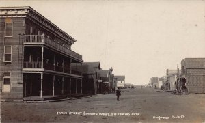 J79/ Bassano Alberta Canada RPPC Postcard c1940s Main Street Stores  380