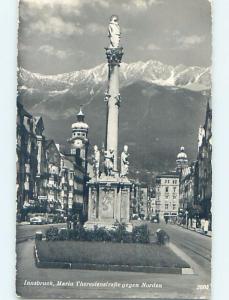 old rppc CARS AND BUILDINGS BY STATUE Innsbruck Austria HM1446