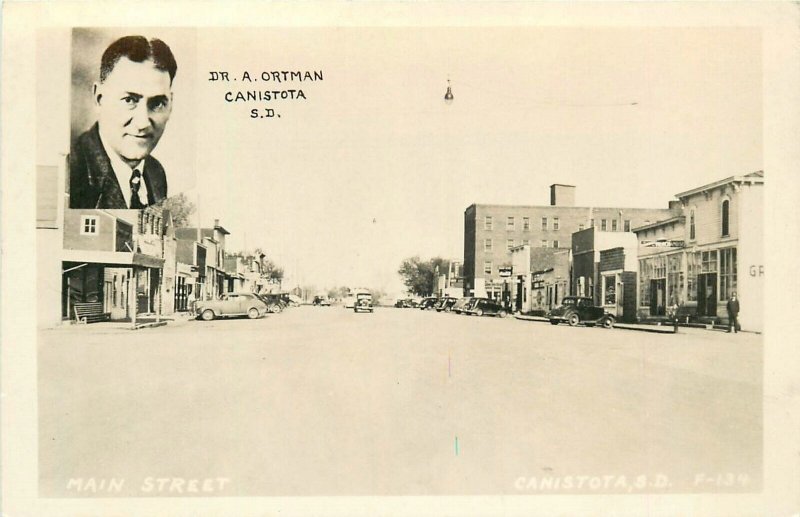 Postcard RPPC 1940s South Dakota Canistota Main Street Dr. Ortman SD24-4797