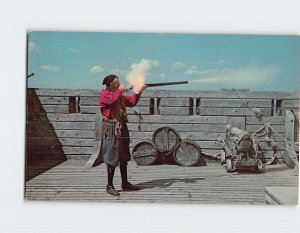 Postcard A guide fires a musket, Plimoth Plantation, Plymouth, Massachusetts
