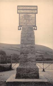 WIDECOMBE IN THE MOOR DEVON UK ORNAMENTAL SIGN REAL PHOTO POSTCARD