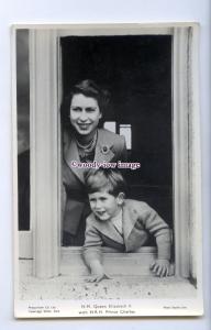 r3114 - Young Prince Charles hanging out of the Window, with his Mum - postcard