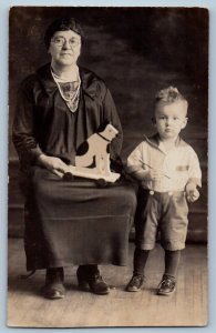 c1910's Grandma And Little Boy Pull Toy Dog Studio RPPC Photo Antique Postcard
