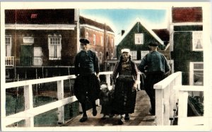 Family Crossing Bridge In Marken Netherlands Postcard