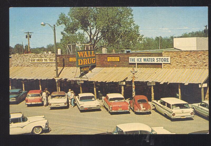 WALL SOUTH DAKOTA DRUG STORE ADVERTISING POSTCARD VOLKSWAGEN 1960's CARS