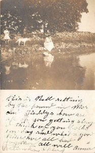 Lot194 usa woaman and a dog near river real photo social history oklahoma