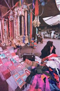 VINTAGE CONTINENTAL POSTCARD LADIES APPAREL SHOP VEIL CLAD LADY COLONY PAKISTAN