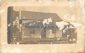 Taiton Texas c1910 RPPC Real Photo Postcard Farmhouse Couple On Porch