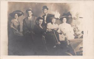 FRIENDS OR FAMILY STUDIO POSE IN VINTAGE AUTOMOBILE~REAL PHOTO POSTCARD 1910s