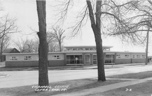 Clear Lake Iowa~Chappell Clinic~Lady on Sidewalk~1950s RPPC Postcard