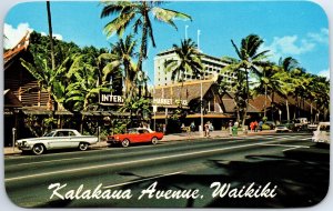 VINTAGE POSTCARD STREET SCENE ON KALALAUA AVENUE WAIKIKI HAIWAII 1970s