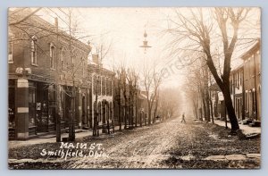 J87/ Smithfield Ohio RPPC Postcard c1910 Steubenville Main St Stores 1725