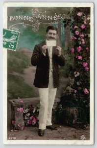 Handsome French Man Holding Letter Flowers RPPC Bonne Annee Postcard V23