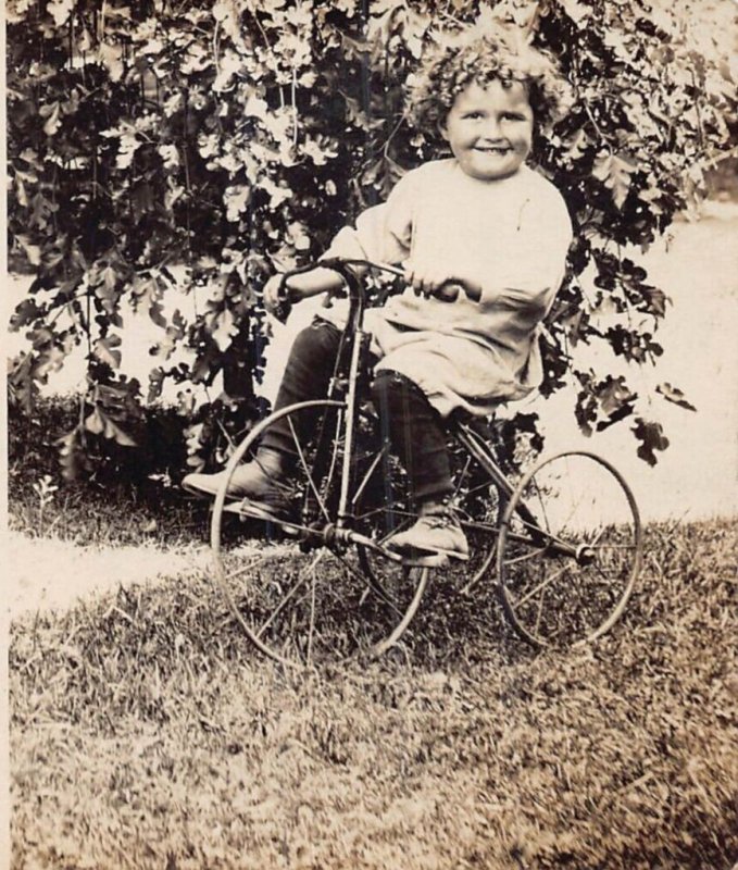 BOY RIDING TRICYCLE-IDENTIFIED EARL BROWN-JACKSON MICHIGAN~REAL PHOTO POSTCARD