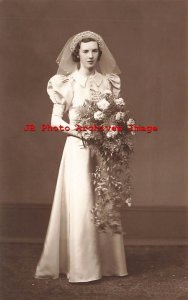 Studio Shot, RPPC, Bride in Wedding Dress Holding Flowers