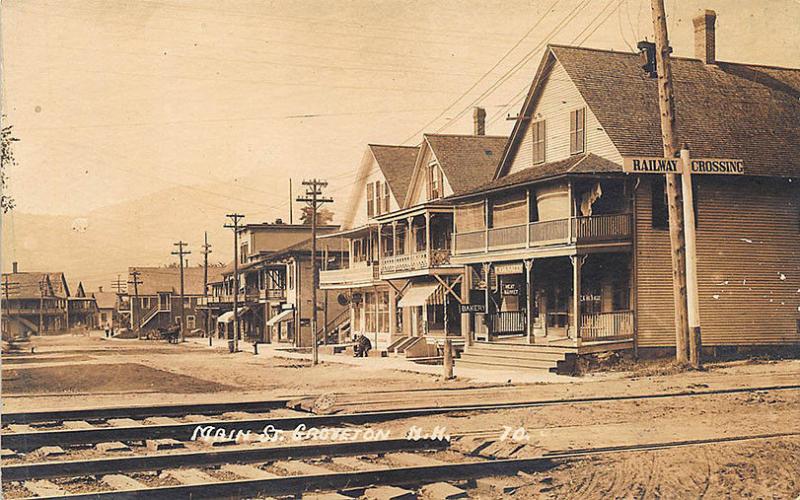 Groveton NH Street View Storefronts McNally's Store Train Tracks RPPC Postcard