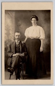 RPPC Cambridge Ohio Middle Age Man and Woman Studio Portrait Postcard Q22