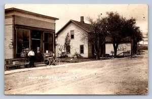 J87/ Ankenytown Ohio RPPC Postcard c1910 Stores Bicycle Main Street 173