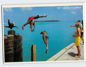 Postcard Divers on the Municipal Dock Key West Florida USA