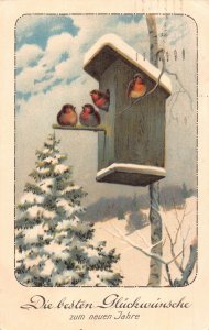 New Year Greetings 1926 Snow Covered Tree Birds in House Nest postcard