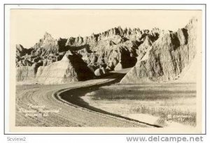 Real Photo: Entrance to Dinosaur Playground, Badlands, South Dakota 1950-70s