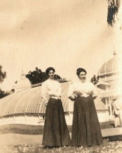 Vintage 1909 RPPC Postcard Two Women In Front of Giant Glass Greenhouse