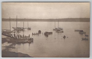 RPPC Boating Lessons Children Rowing Miniature Sailboats in Waters Postcard H27