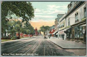MILFORD MA MAIN STREET LOOKING EAST ANTIQUE POSTCARD
