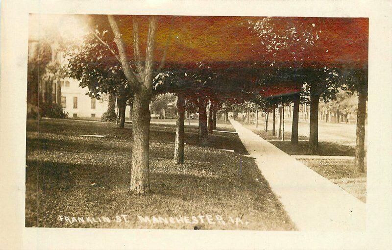 Franklin Street Manchester Iowa 1912 RPPC Photo Postcard 762