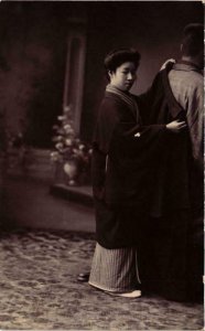 PC CPA japanese lady dressing her husband real photo JAPAN (a12714)