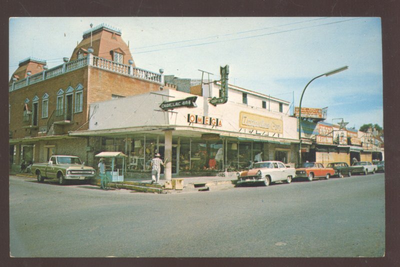 NUEVO LAREDO MEXICO DOWNTOWN STREET SCENE 1950's CARS VINTAGE POSTCARD