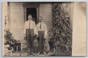 RPPC Two Handsome Men in Suspenders Pose for Photo Postcard H26