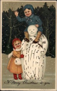 PFB Serie 7119 Christmas Children Cute Kids Playing with Snowman c1910 PC