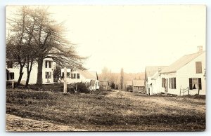 c1910 ROWS OF HOUSES STREET VIEW UNKNOWN DIRT ROAD CYKO RPPC POSTCARD P2800G